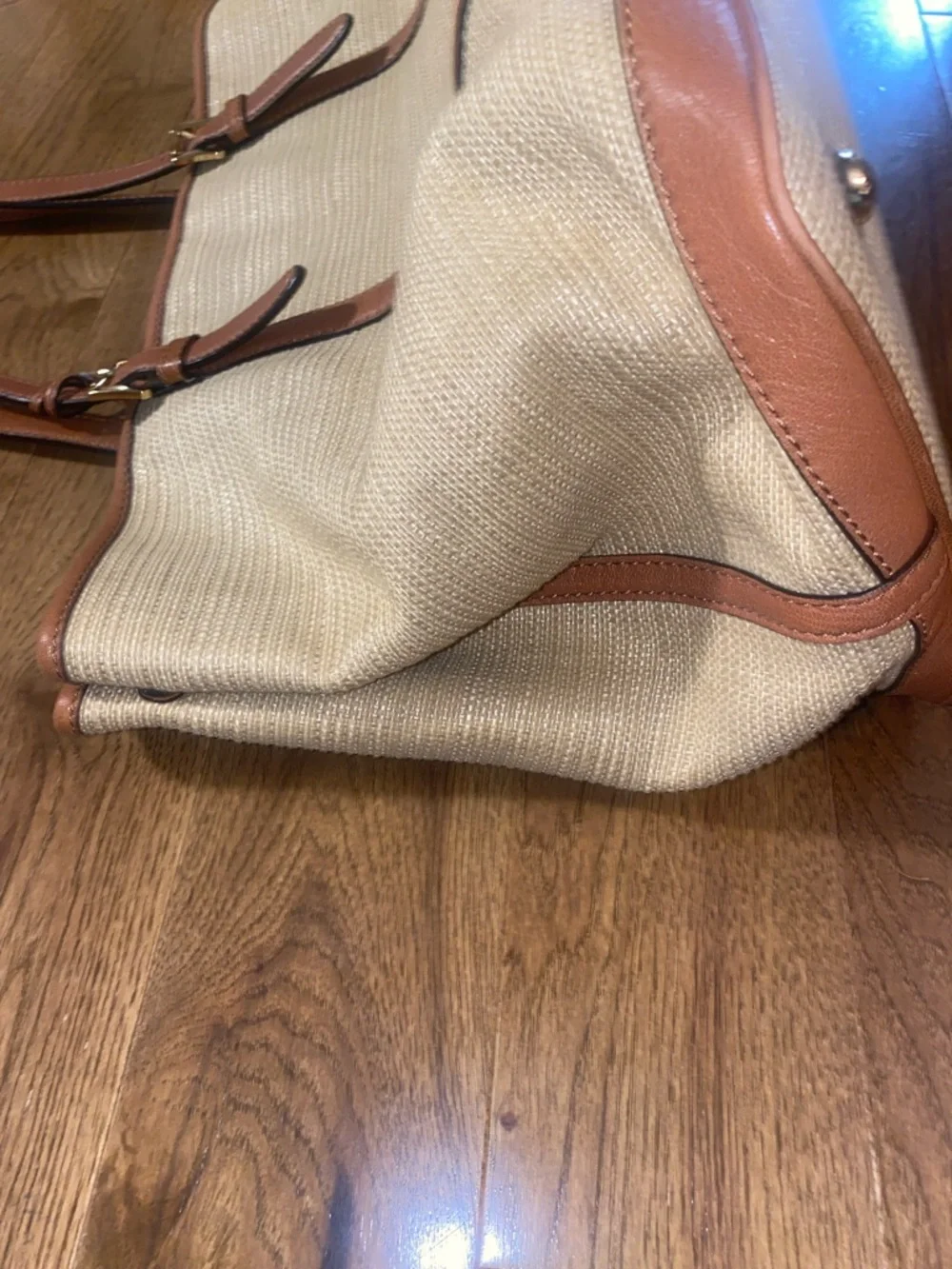 Michael Kors Raffia Tote with Tan Leather Trim and handles.